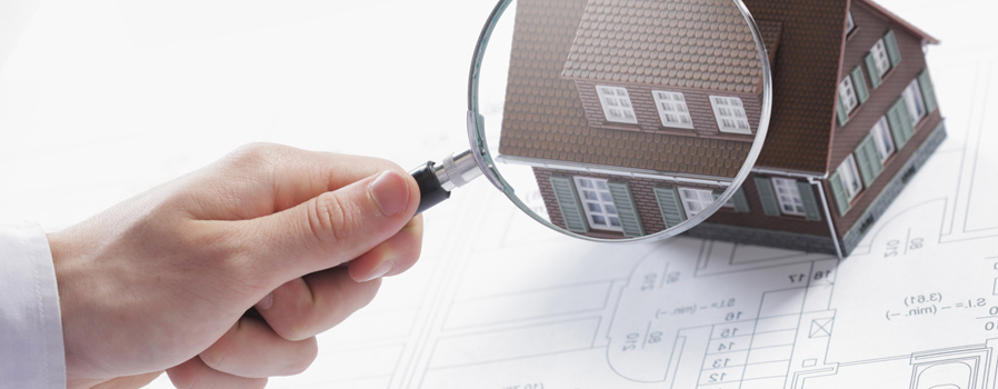 Inspecting a home model with a magnifying glass